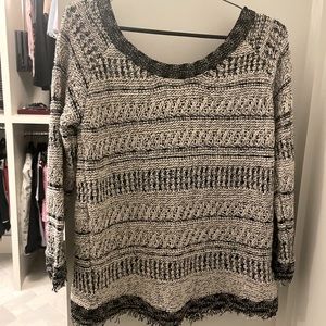 Chanel-like Zara sweater with split open back.